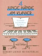 Quatre jeunes mains au piano 